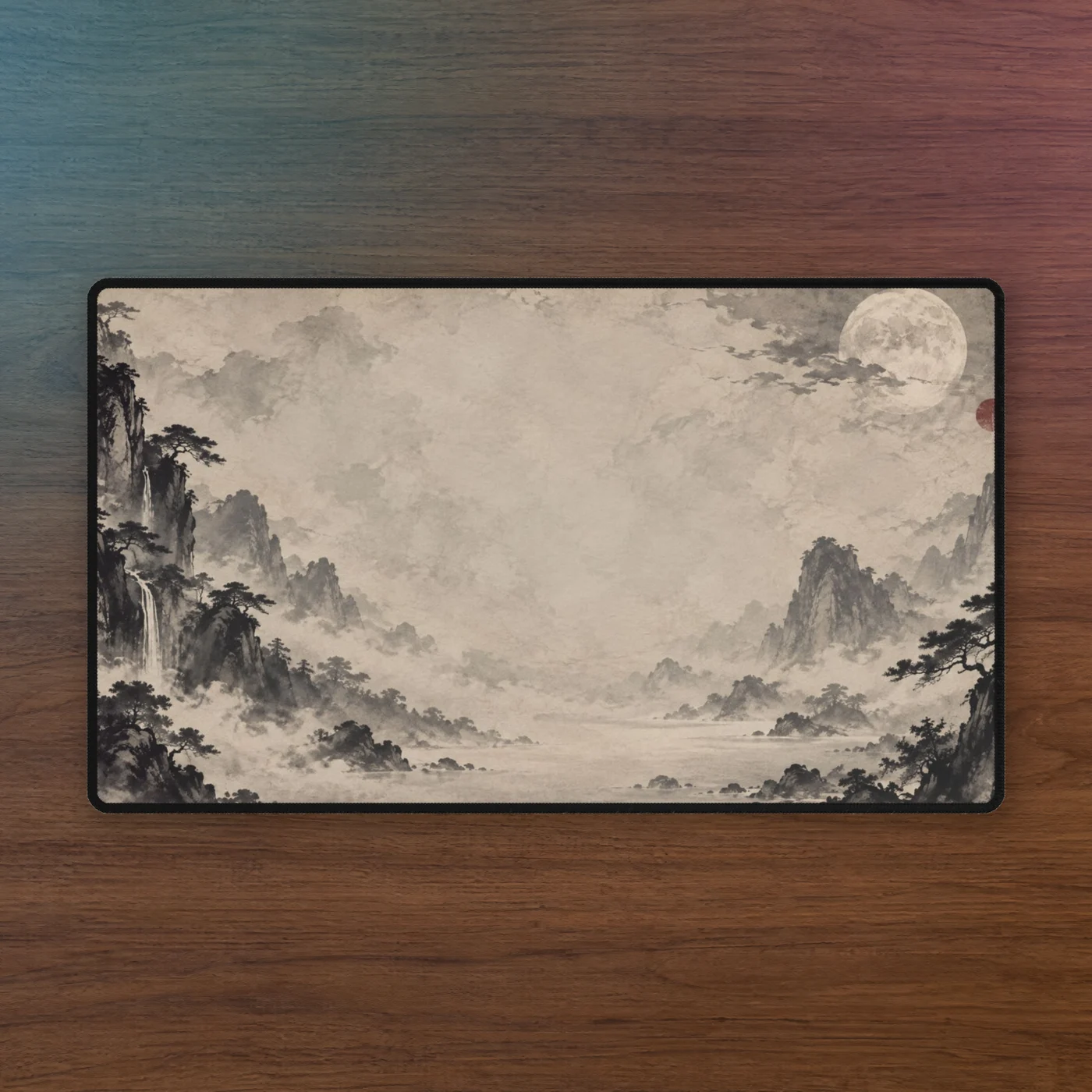 Moon Ink playmat on walnut